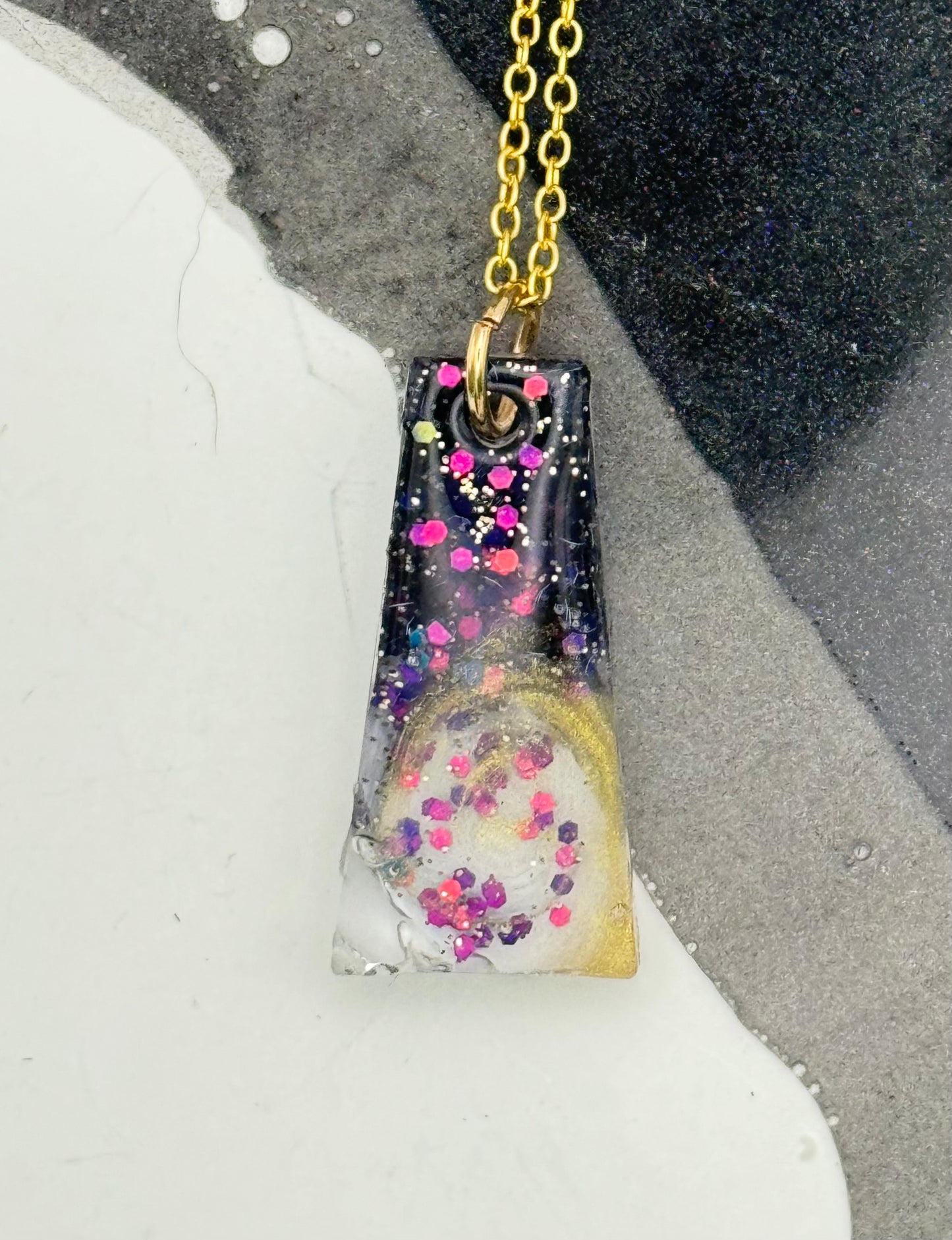 Black and purple glitter pendant