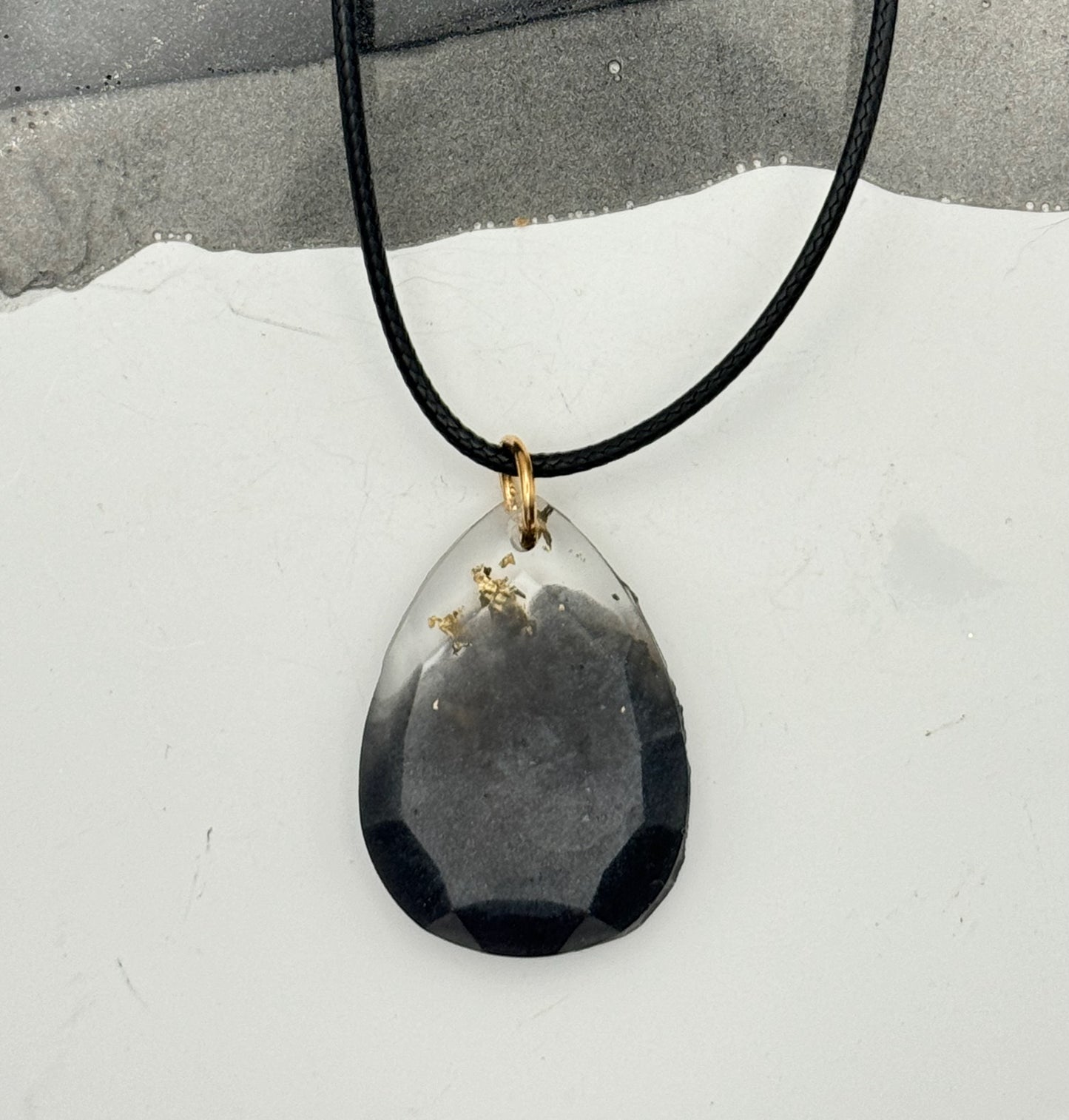 Teardrop-cut black and gold elegance pendant