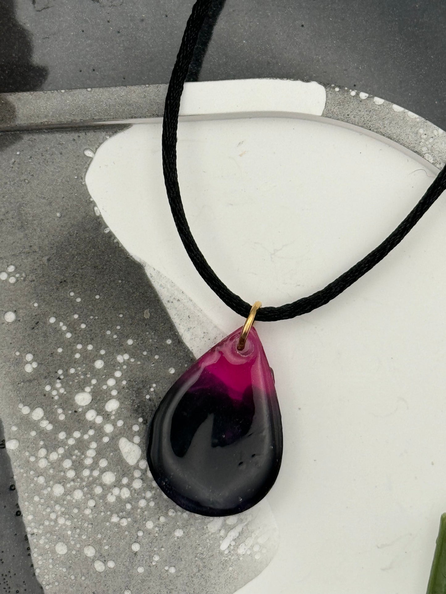Pink and black teardrop pendant