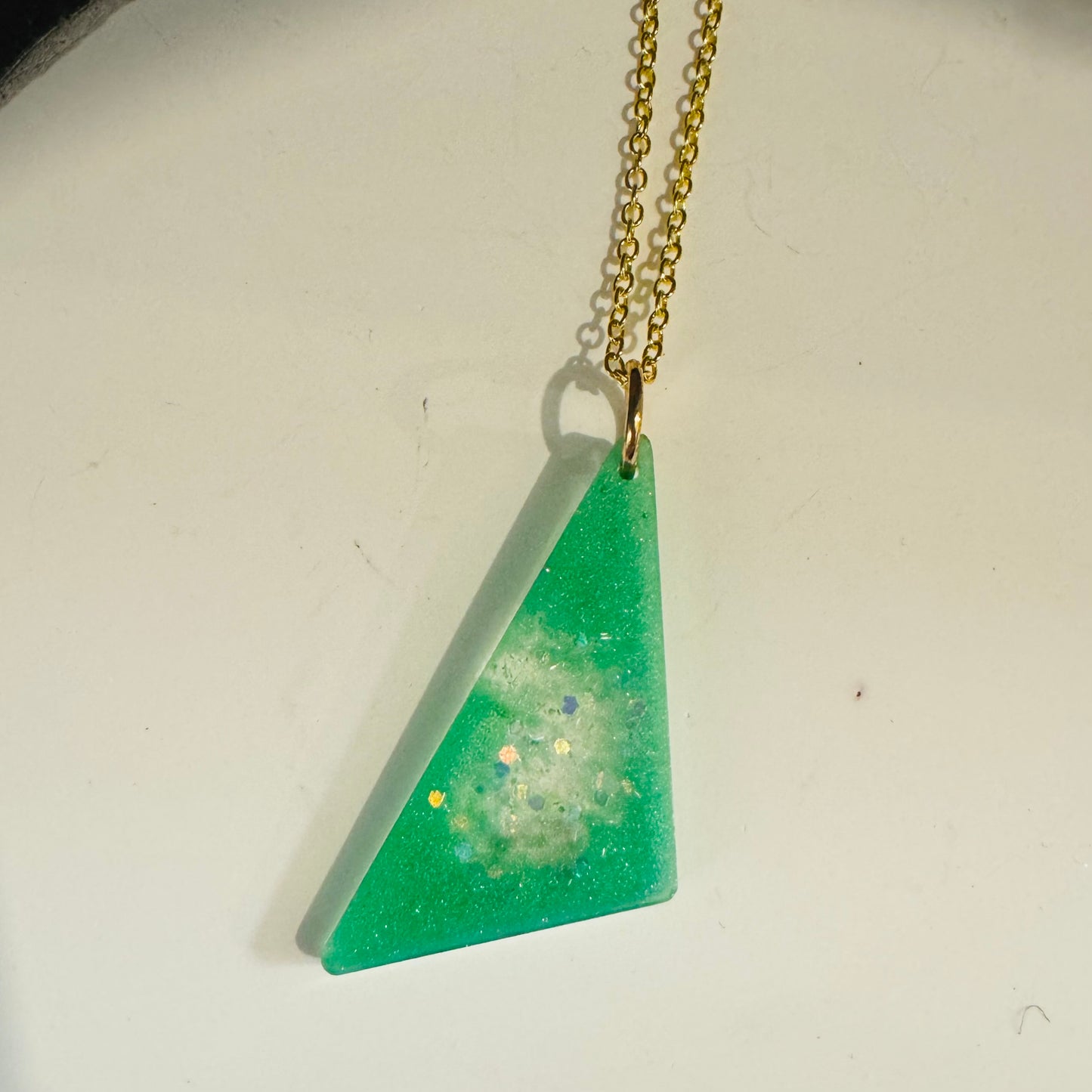 Emerald glow triangle pendant