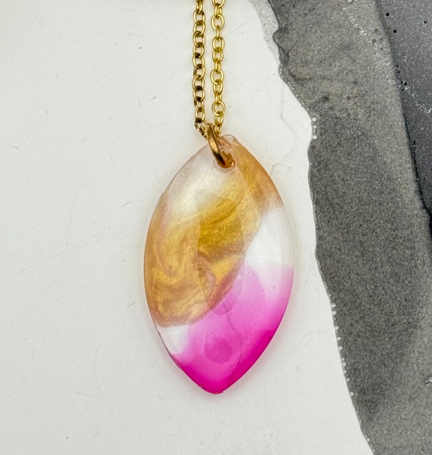 Pink and gold pendant