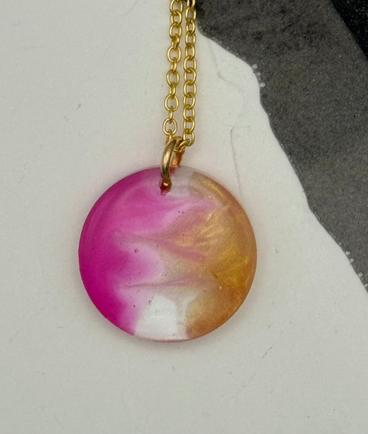 Pink and gold round pendant