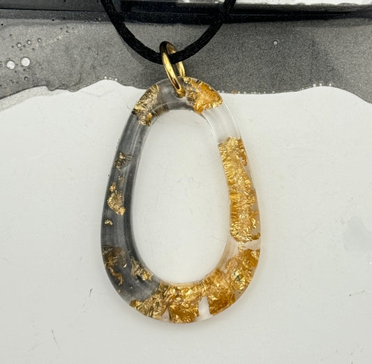 Oval Black and Gold Glow