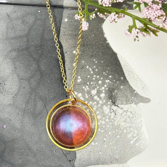 Pink circle with double gold pendant