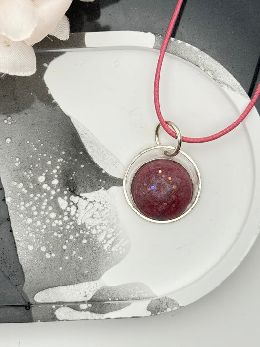 Pink and silver round pendant