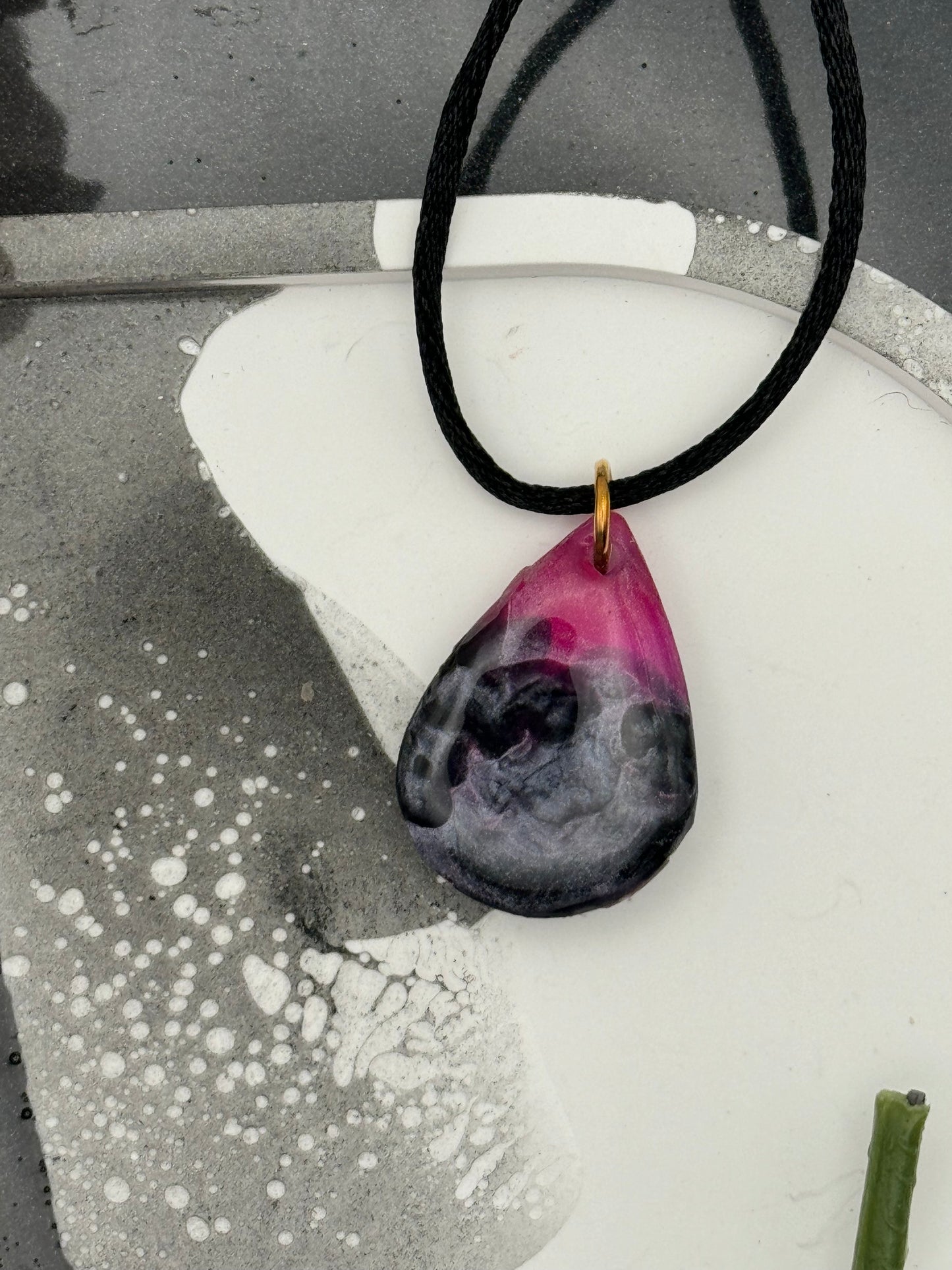 Pink and black teardrop pendant