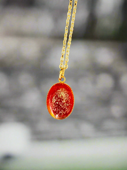 oval red resin pendant